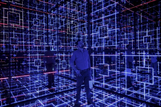 Man looks at an exhibition called "Oh! Future Sensation" as part of Saint-Gobain's 350th anniversary celebrations, in Sao Paulo