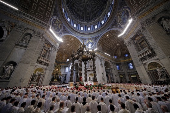 Pope Francis stands as he leads the Chrism mass in Saint Peter's basilica at the Vatican