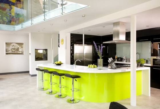 White open plan kitchen breakfast bar lime green acrylic island unit stools Corian worktop hob extractor fan hood tiled flooring real home 25 BK 2007 Not Used